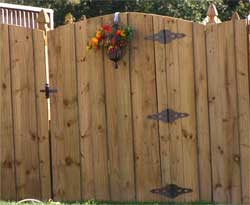 wooden arched fence gate