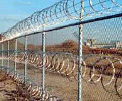 chain link fence with razor wire